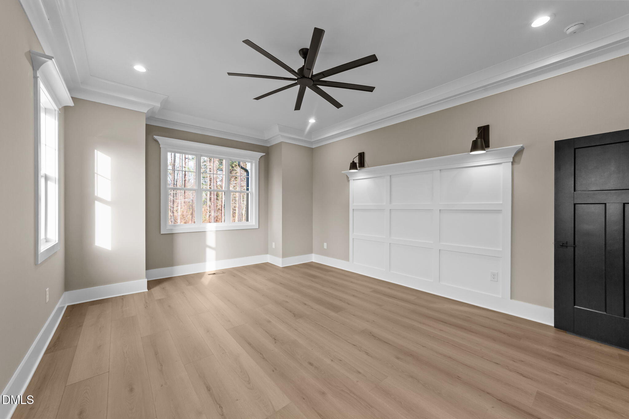 2590 Lassiter Road Four Oaks, NC 27524 - Photo 27 of 55 a view of an empty room with a window and wooden floor