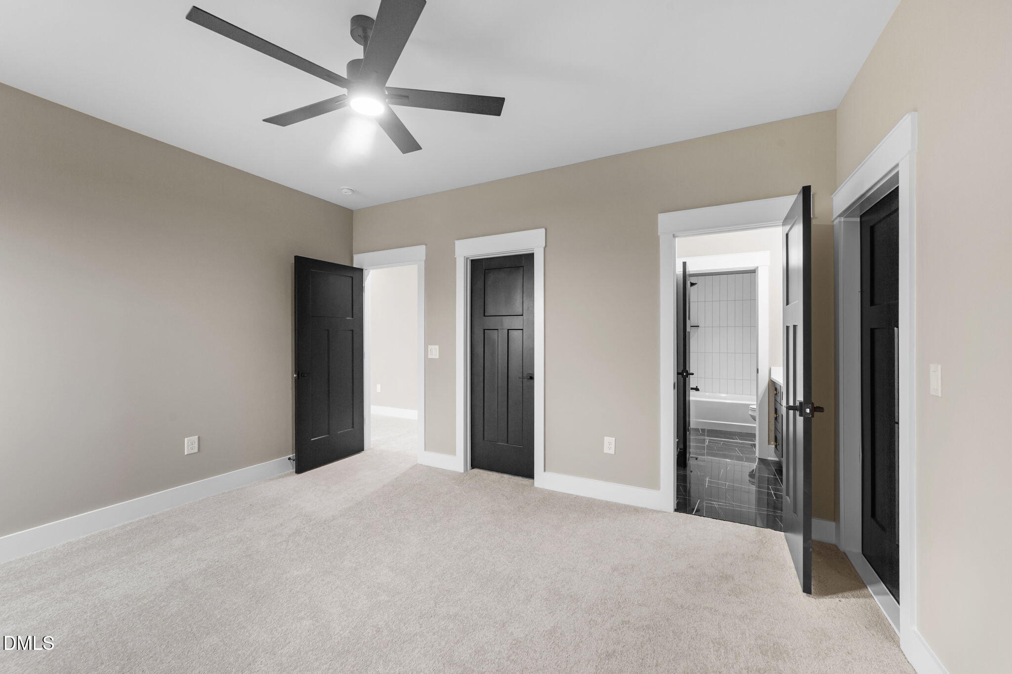 2590 Lassiter Road Four Oaks, NC 27524 - Photo 36 of 55 a view of an empty room with a ceiling fan