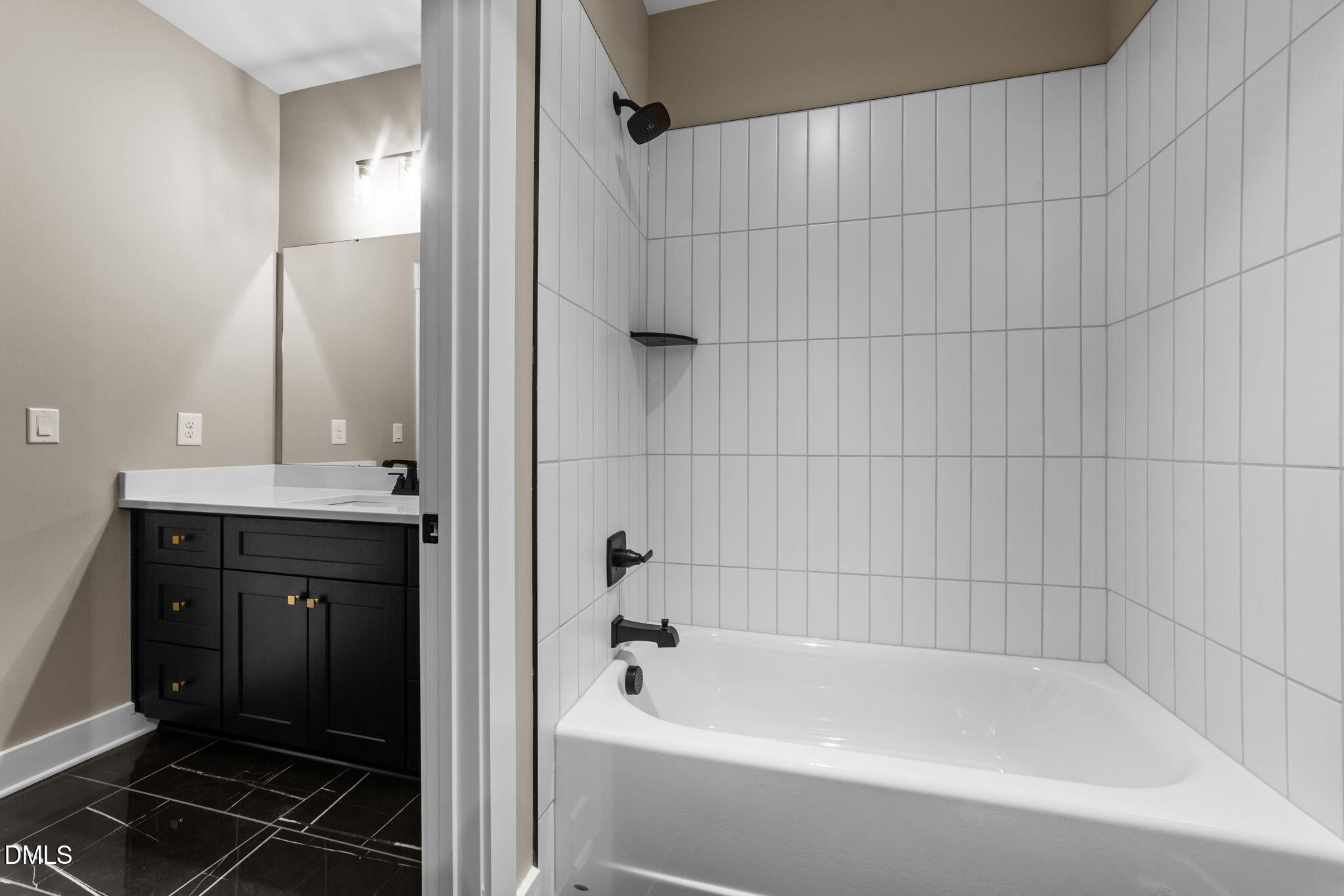 2590 Lassiter Road Four Oaks, NC 27524 - Photo 38 of 55 a bathroom with a bathtub and a sink