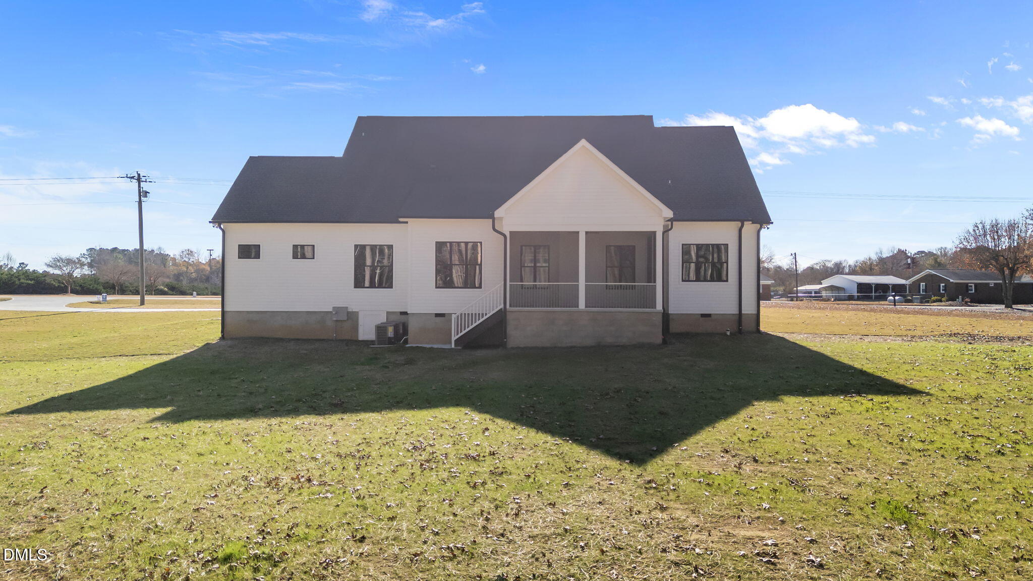 2590 Lassiter Road Four Oaks, NC 27524 - Photo 43 of 55 a front view of a house with garden