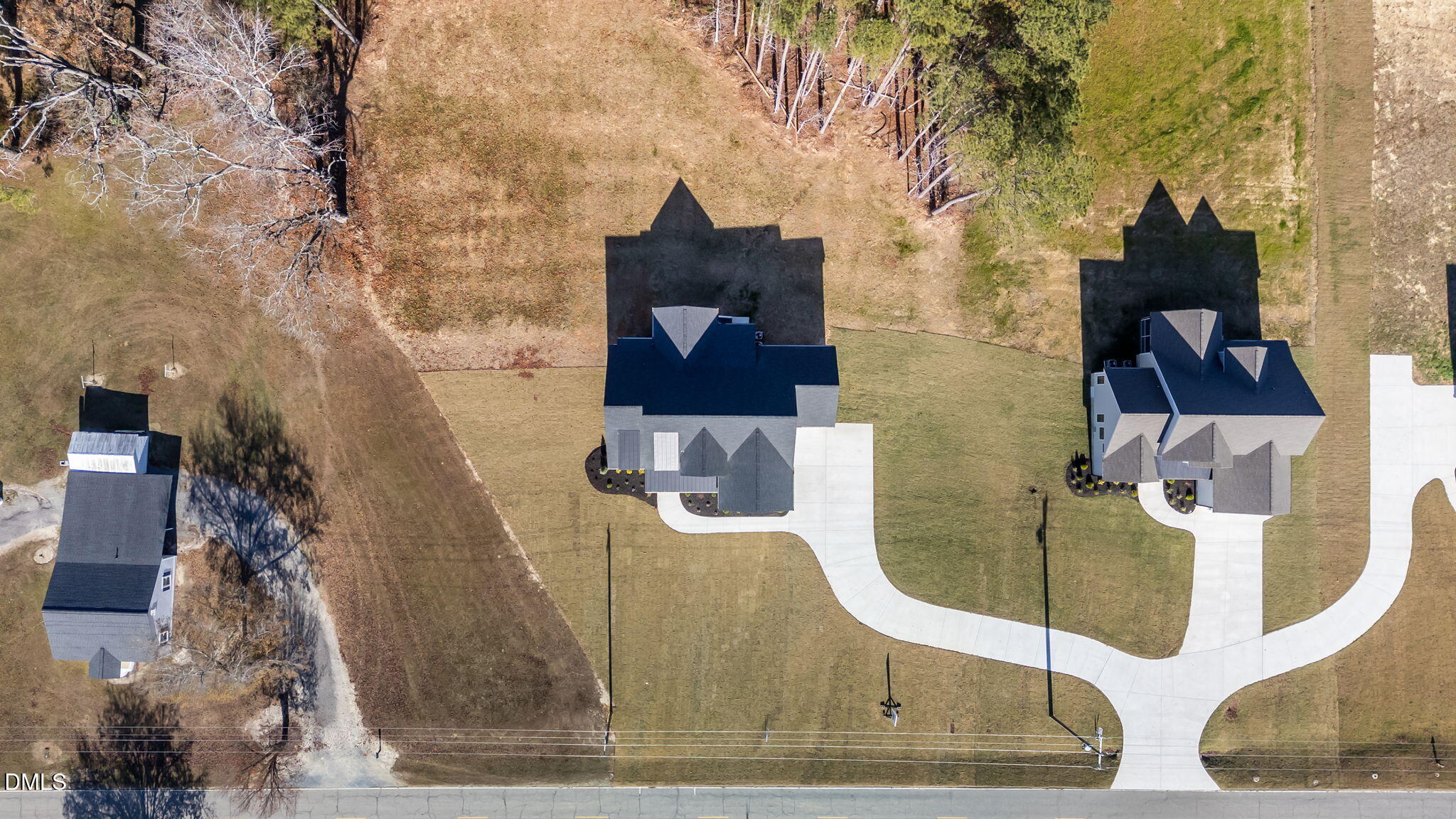 2590 Lassiter Road Four Oaks, NC 27524 - Photo 53 of 55 an aerial view of a house with outdoor space