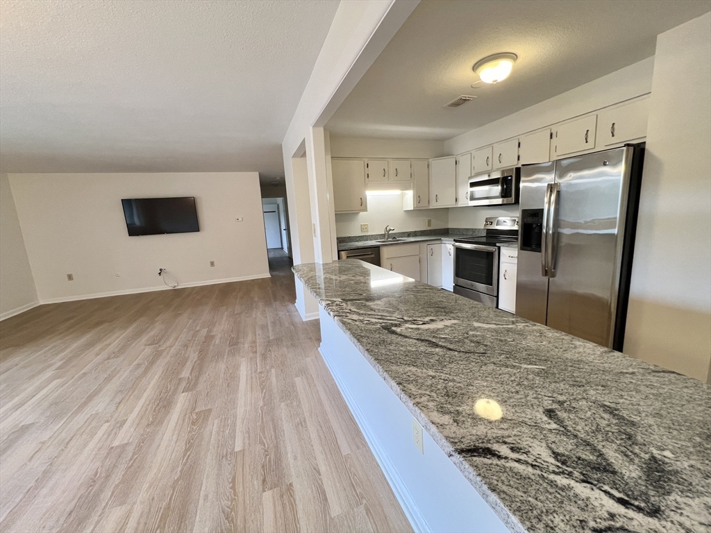 1004 Paradise Road, Unit 1H Swampscott, MA 01907 - Photo 1 of 30