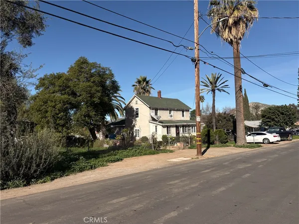 a street view along with residential houses