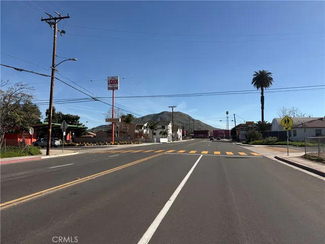 a view of a city street both side of a road