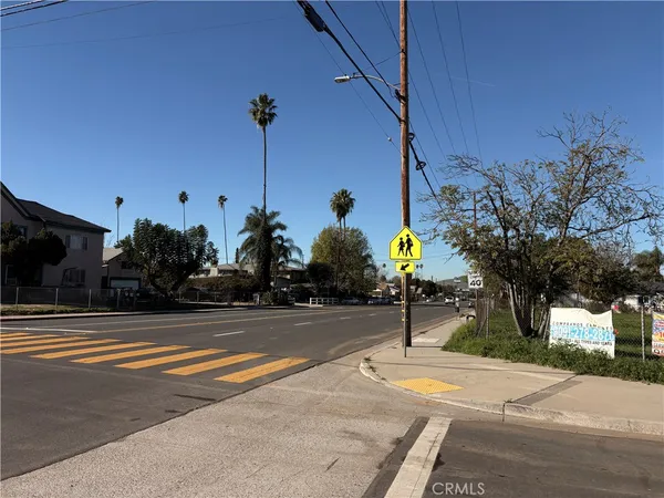 a view of a street with houses
