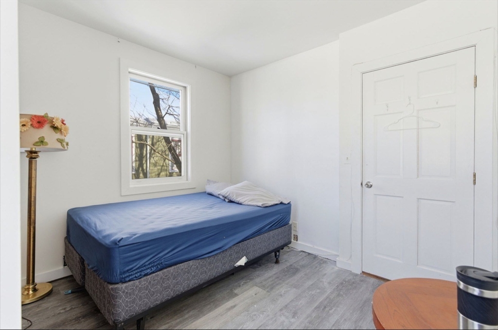 20 Central Avenue Danvers, MA 01923 - Photo 14 of 21 a room with a bed and a window