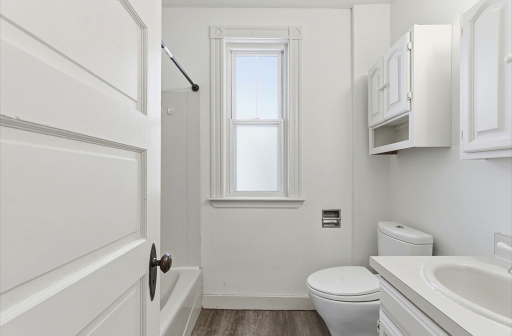 20 Central Avenue Danvers, MA 01923 - Photo 17 of 21 a bathroom with a granite countertop sink toilet and shower