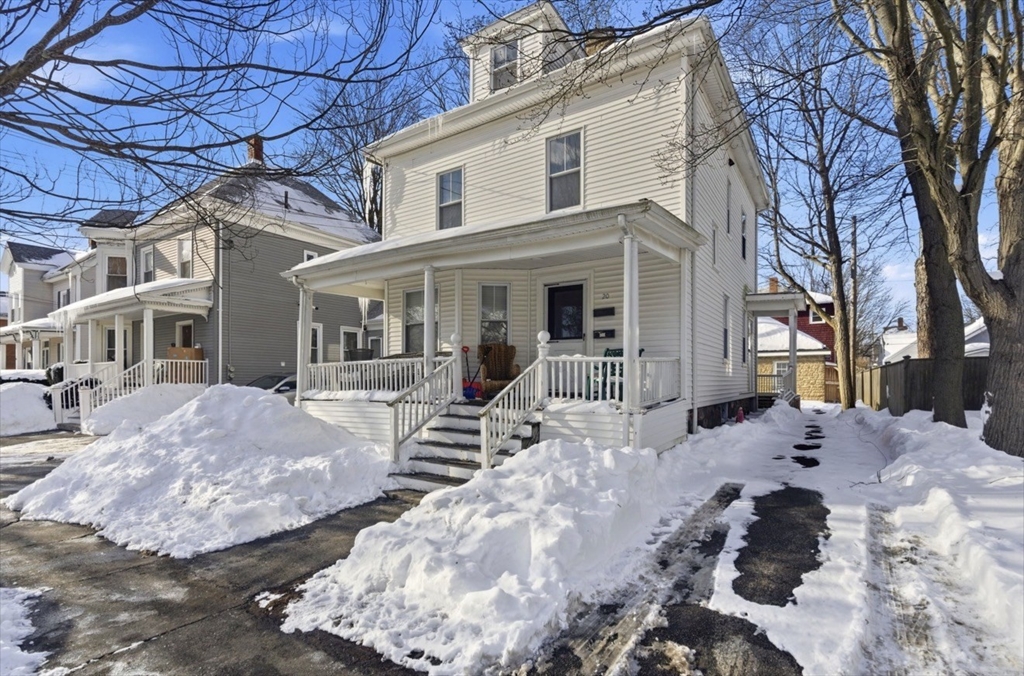 20 Central Avenue Danvers, MA 01923 - Photo 2 of 21 a view of a house with a yard covered in snow
