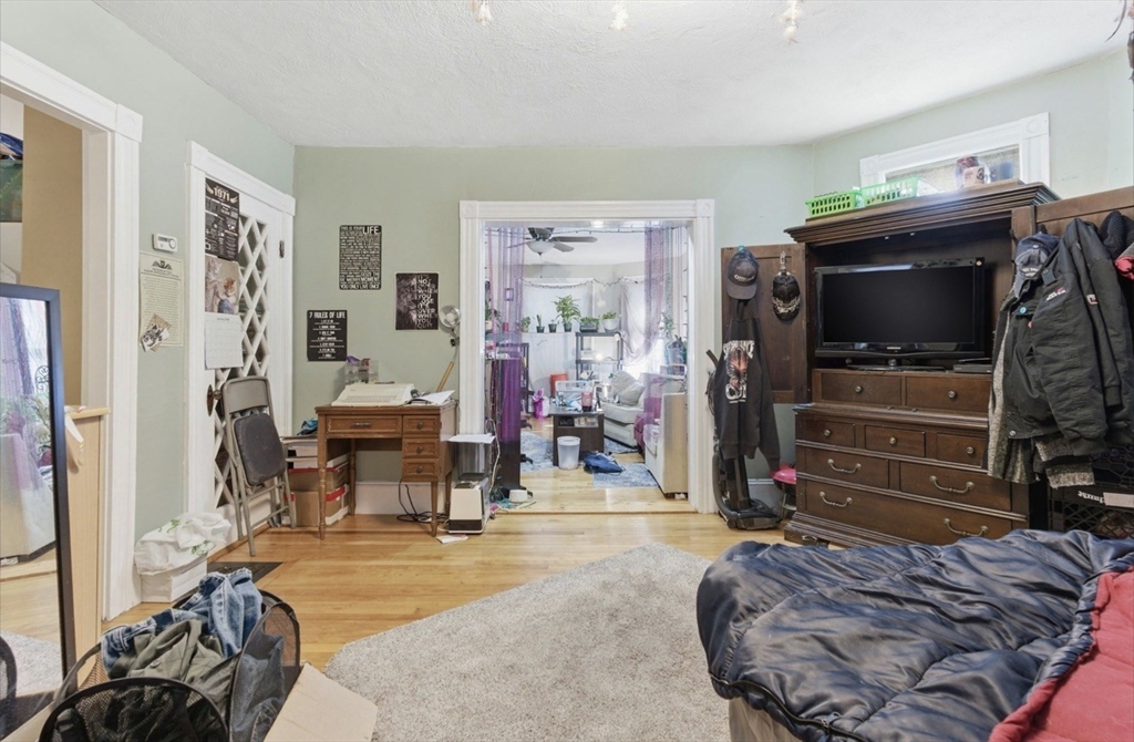20 Central Avenue Danvers, MA 01923 - Photo 6 of 21 a living room with furniture and a flat screen tv