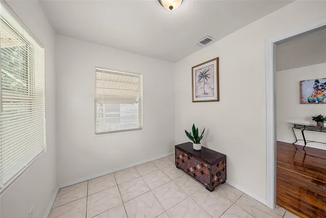 a view of a hallway with workspace