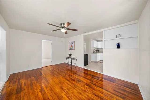 a view of a livingroom with wooden floor