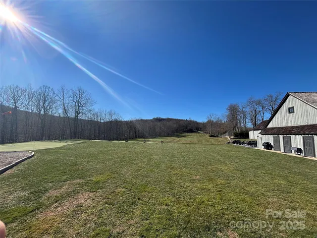 a front view of a building with sitting area