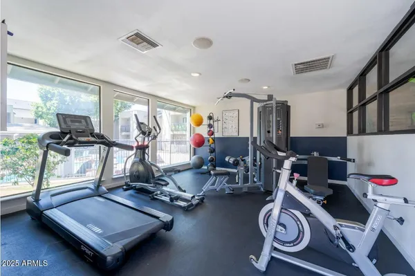 a view of a room with gym equipment
