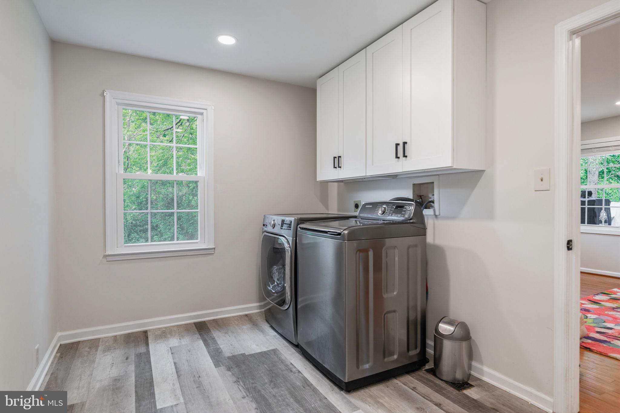 7603 Modisto Lane Springfield, VA 22153 - Photo 35 of 57 a utility room with closet dryer and washer