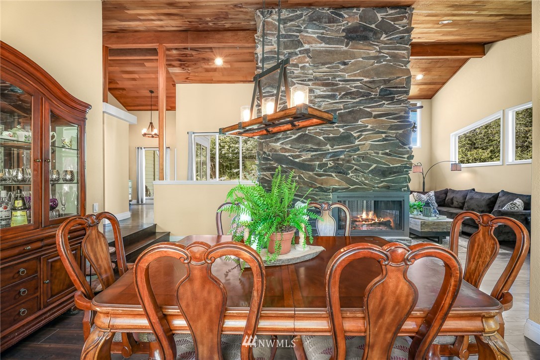 2287 East Hemmi Road Bellingham, WA 98226 - Photo 17 of 35 a dining room with furniture and windows