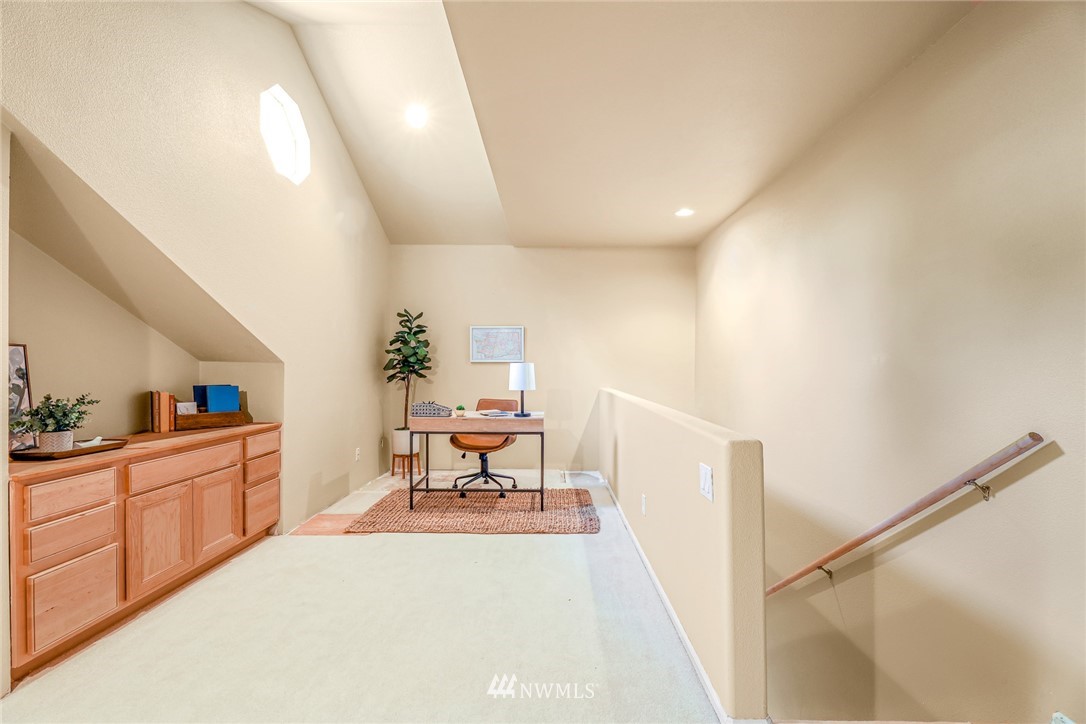 2287 East Hemmi Road Bellingham, WA 98226 - Photo 26 of 35 a living room with furniture and a wooden floor