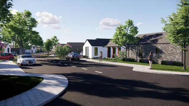 a city street lined with buildings and trees