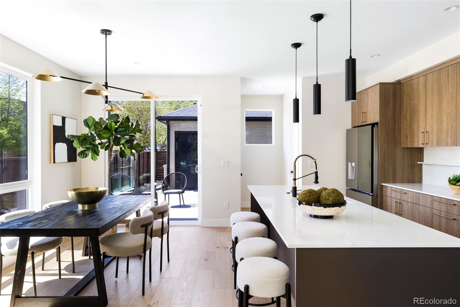 2203 West 37th Avenue Denver, CO 80211 - Photo 5 of 26 a view of kitchen with furniture and a potted plant