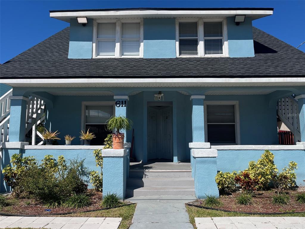 611 Ora Street, Unit 2 Daytona Beach, FL 32118 - Photo 1 of 7 a view of a building with potted plants