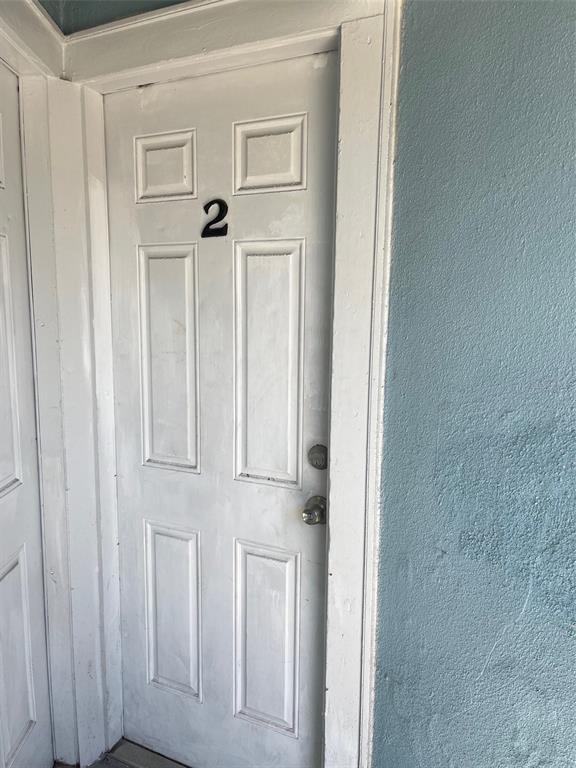 611 Ora Street, Unit 2 Daytona Beach, FL 32118 - Photo 2 of 7 a view of front door