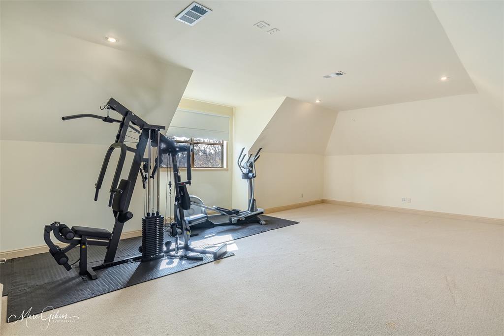 1069 Waters Edge Circle Shreveport, LA 71106 - Photo 31 of 35 a view of a room with gym equipment
