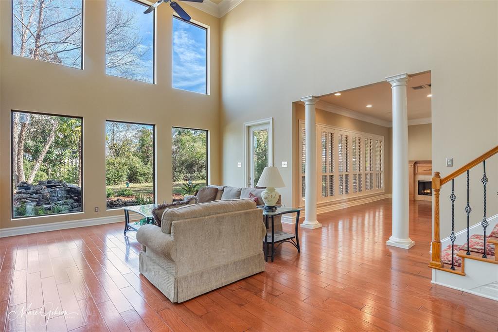 1069 Waters Edge Circle Shreveport, LA 71106 - Photo 10 of 35 a living room with furniture and a large window