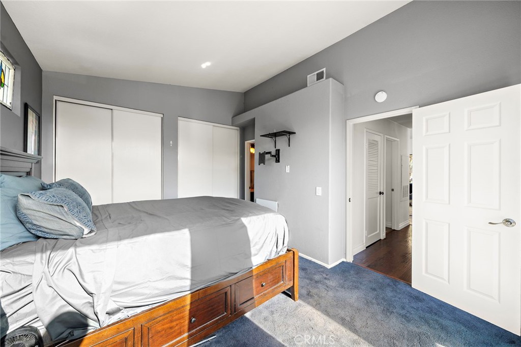 32 Vía Contento Rancho Santa Margarita, CA 92688 - Photo 19 of 33 a bedroom with a bed and a closet