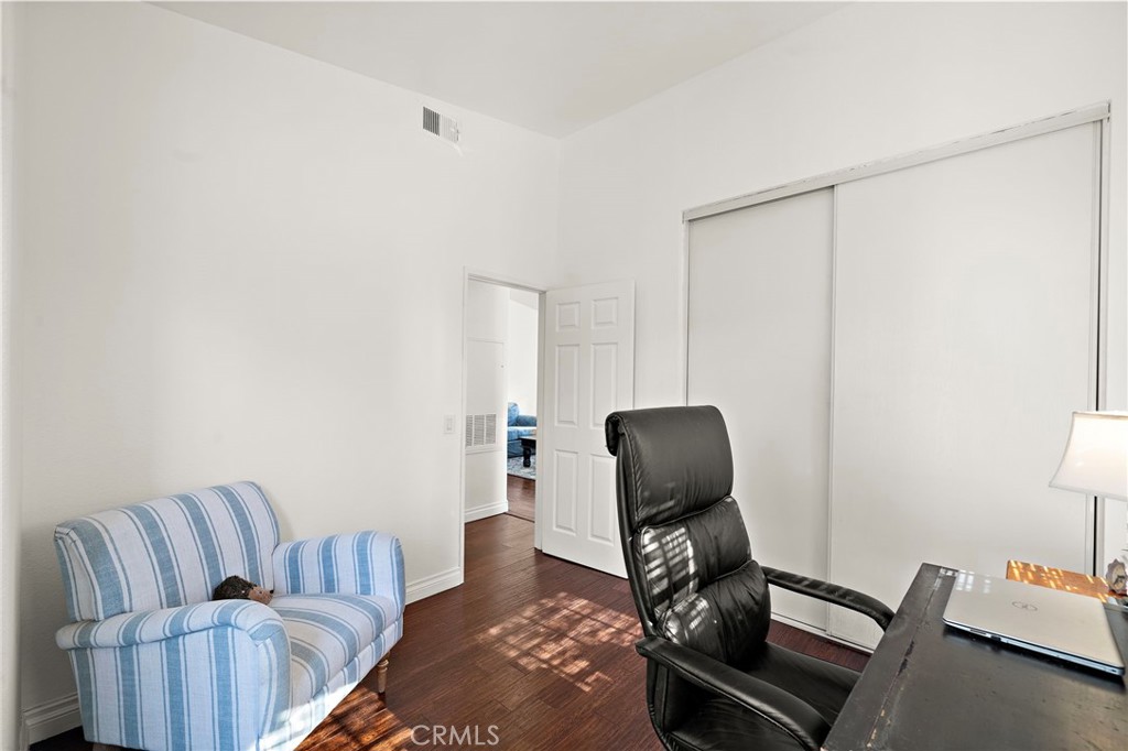 32 Vía Contento Rancho Santa Margarita, CA 92688 - Photo 21 of 33 a living room with furniture and a mirror