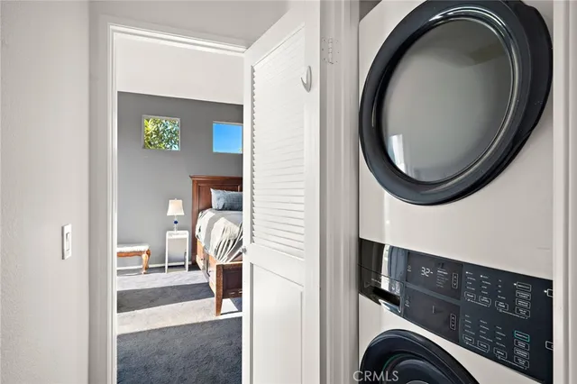 a view of livingroom with washer and dryer