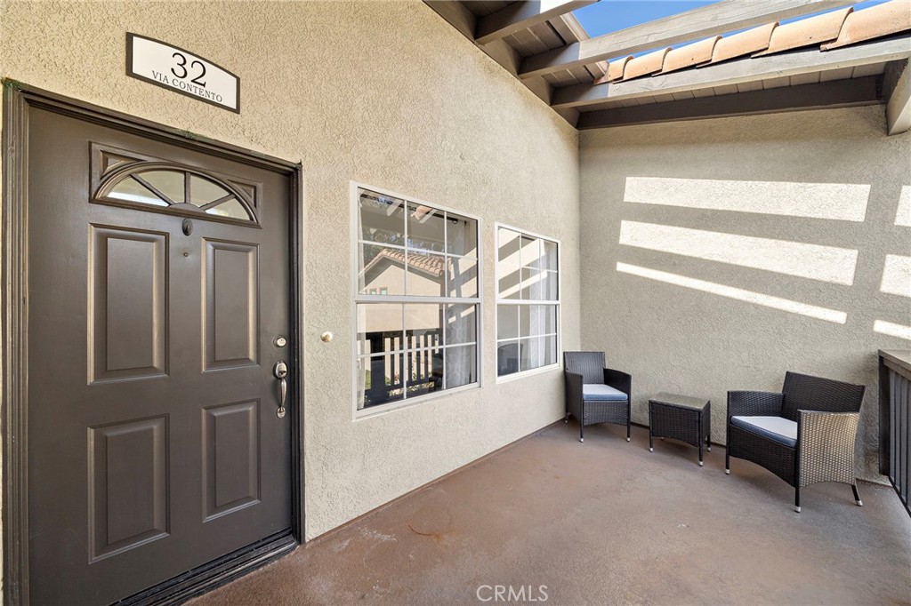 32 Vía Contento Rancho Santa Margarita, CA 92688 - Photo 3 of 33 a view of livingroom with furniture and windows