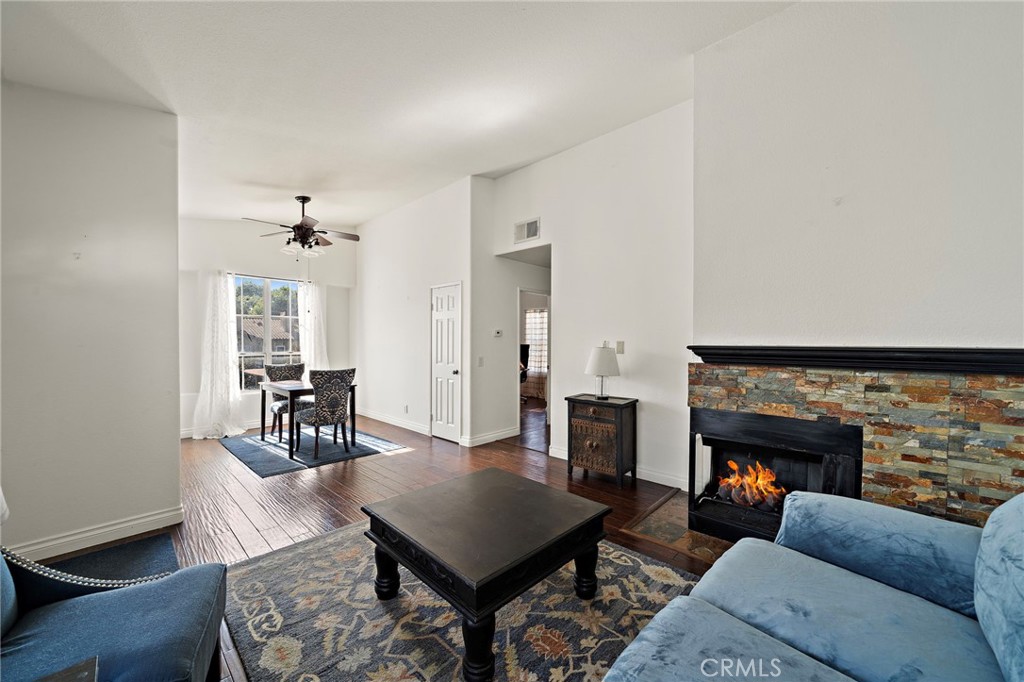 32 Vía Contento Rancho Santa Margarita, CA 92688 - Photo 6 of 33 a living room with furniture and a fireplace