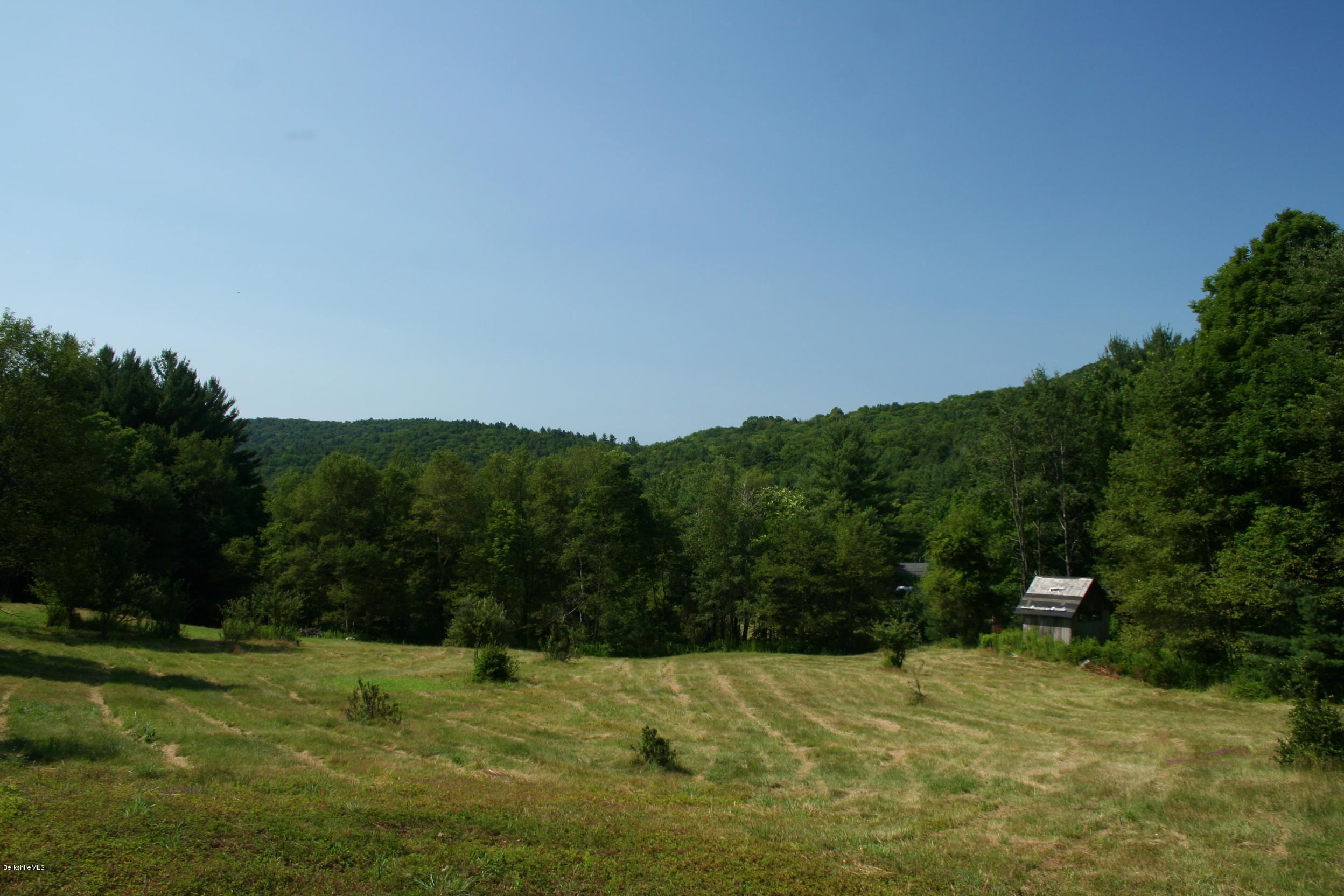 22 Sandisfield Road Sandisfield, MA 01255 - Photo 23 of 27 a backyard of a house with lots of green space