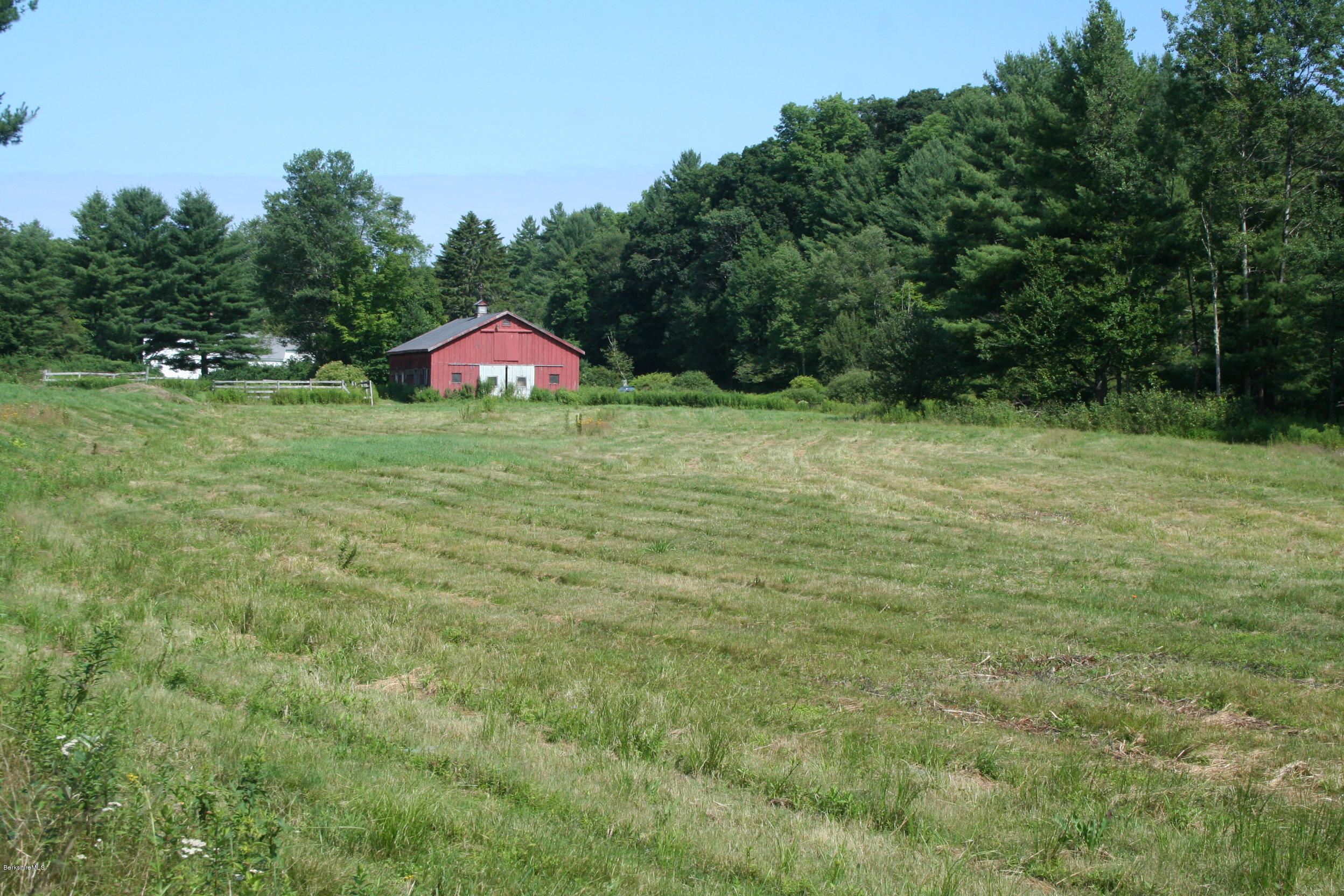 22 Sandisfield Road Sandisfield, MA 01255 - Photo 5 of 27 a backyard of a house with lots of green space