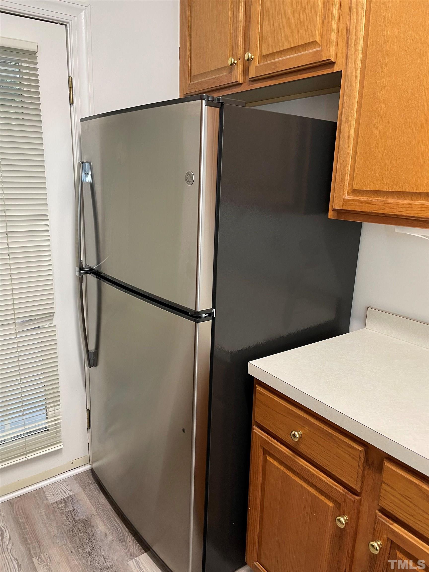 7018 Sandy Forks Road, Unit 202 Raleigh, NC 27615 - Photo 6 of 22 a utility room with dryer and washer