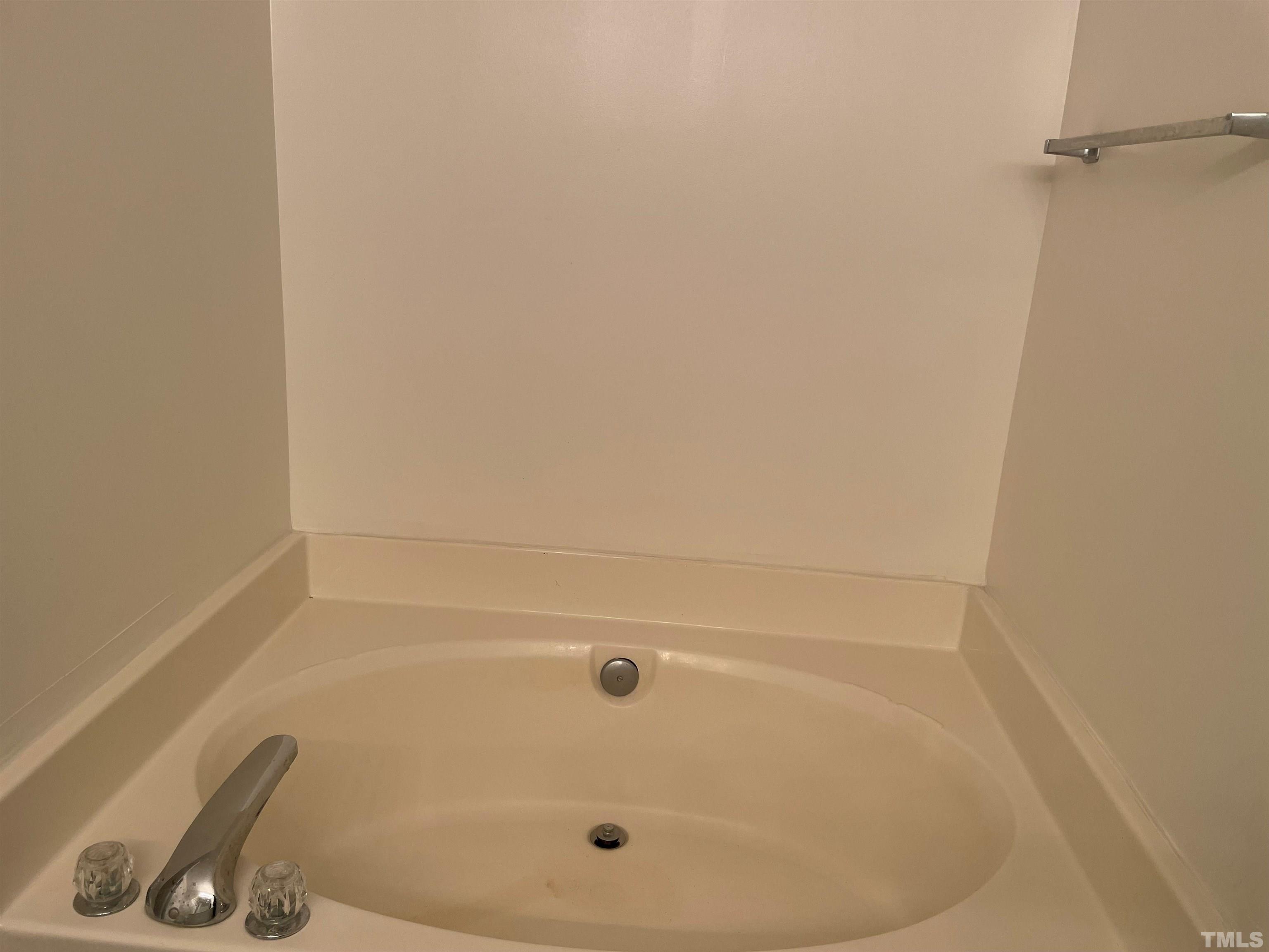 7018 Sandy Forks Road, Unit 202 Raleigh, NC 27615 - Photo 10 of 22 a bathroom with a shower