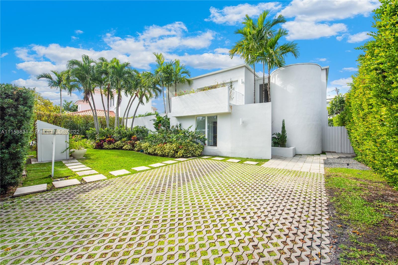 260 Ridgewood Road Key Biscayne, FL 33149 - Photo 1 of 41 a house view with a garden space