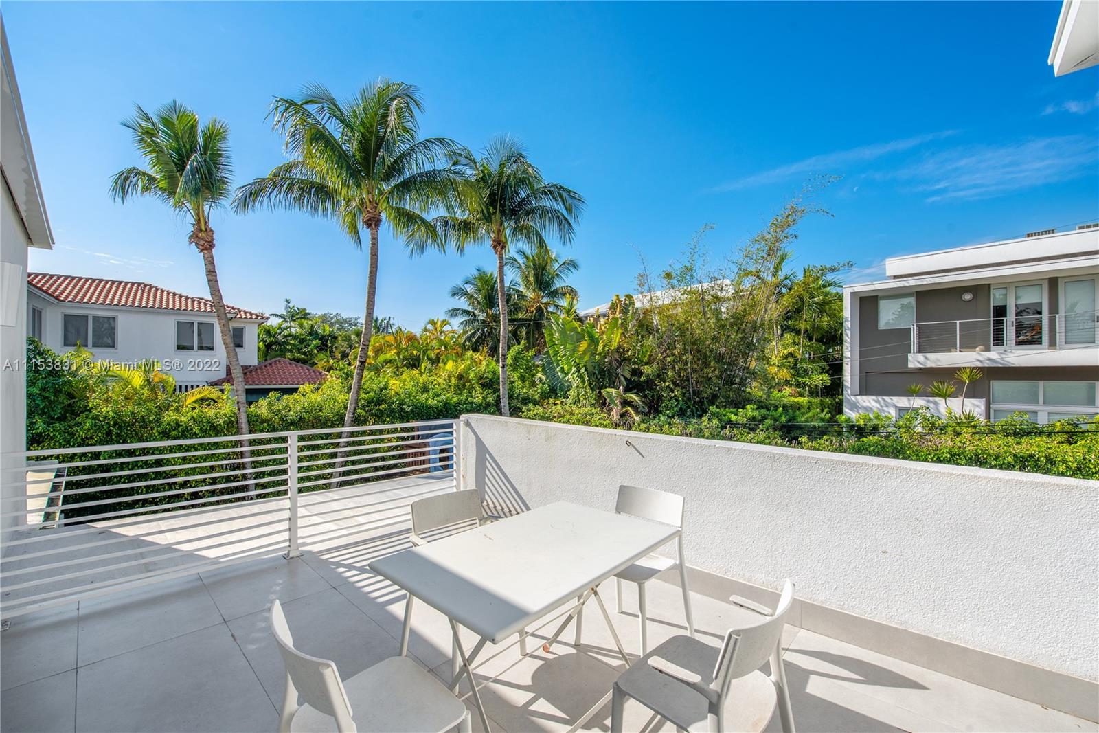 260 Ridgewood Road Key Biscayne, FL 33149 - Photo 23 of 41 a view of outdoor space yard and patio