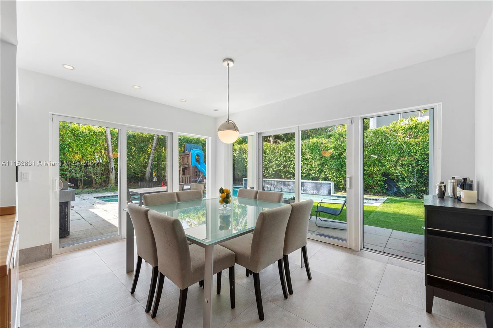 260 Ridgewood Road Key Biscayne, FL 33149 - Photo 6 of 41 a view of a dining room and livingroom view