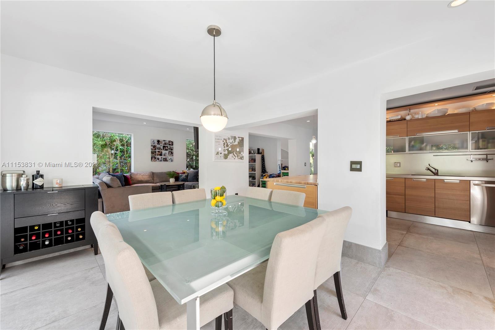 260 Ridgewood Road Key Biscayne, FL 33149 - Photo 7 of 41 a dining room with furniture and window