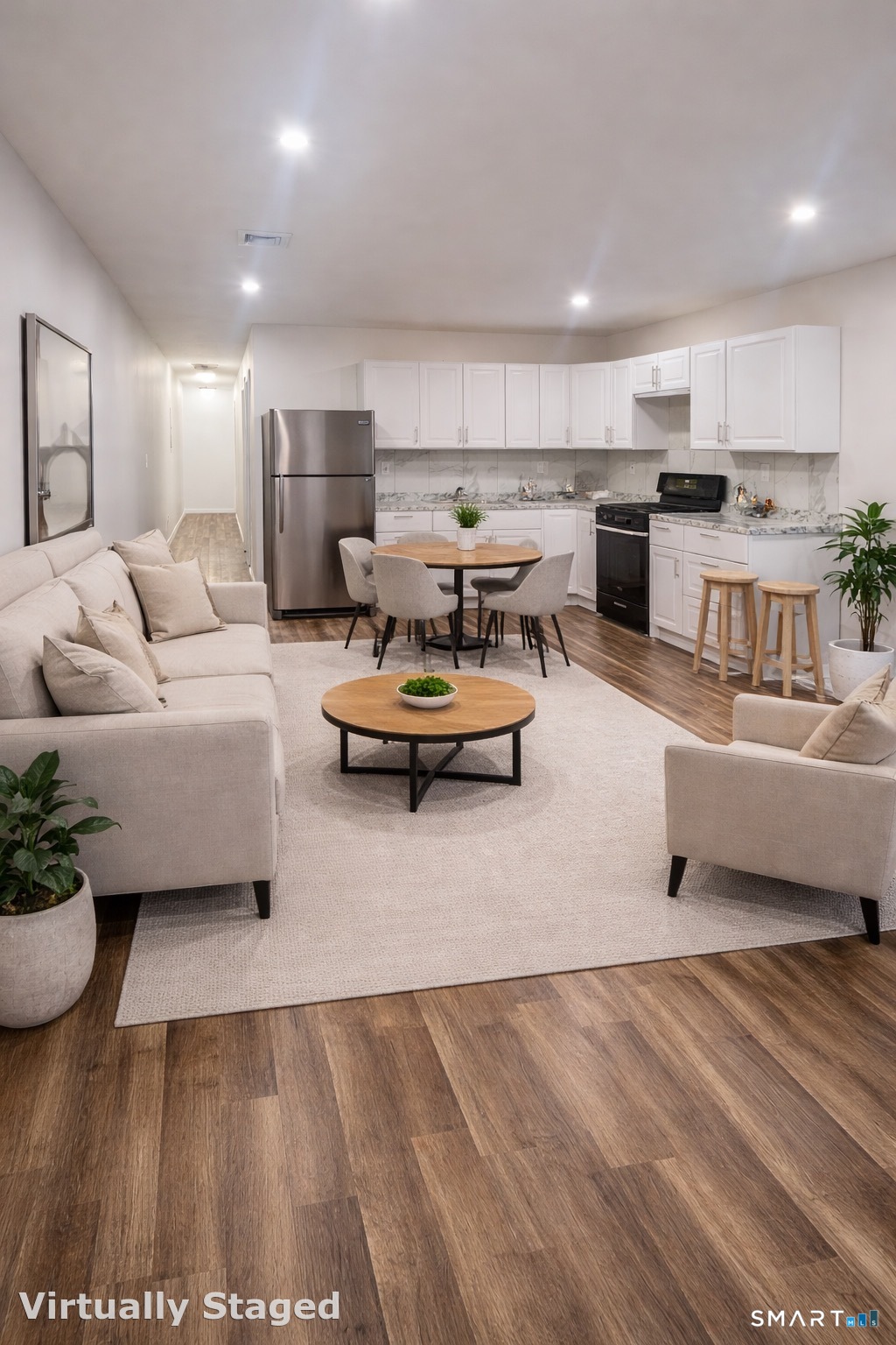 1415 Stratford Avenue Bridgeport, CT 06607 - Photo 2 of 14 a living room with furniture and kitchen view