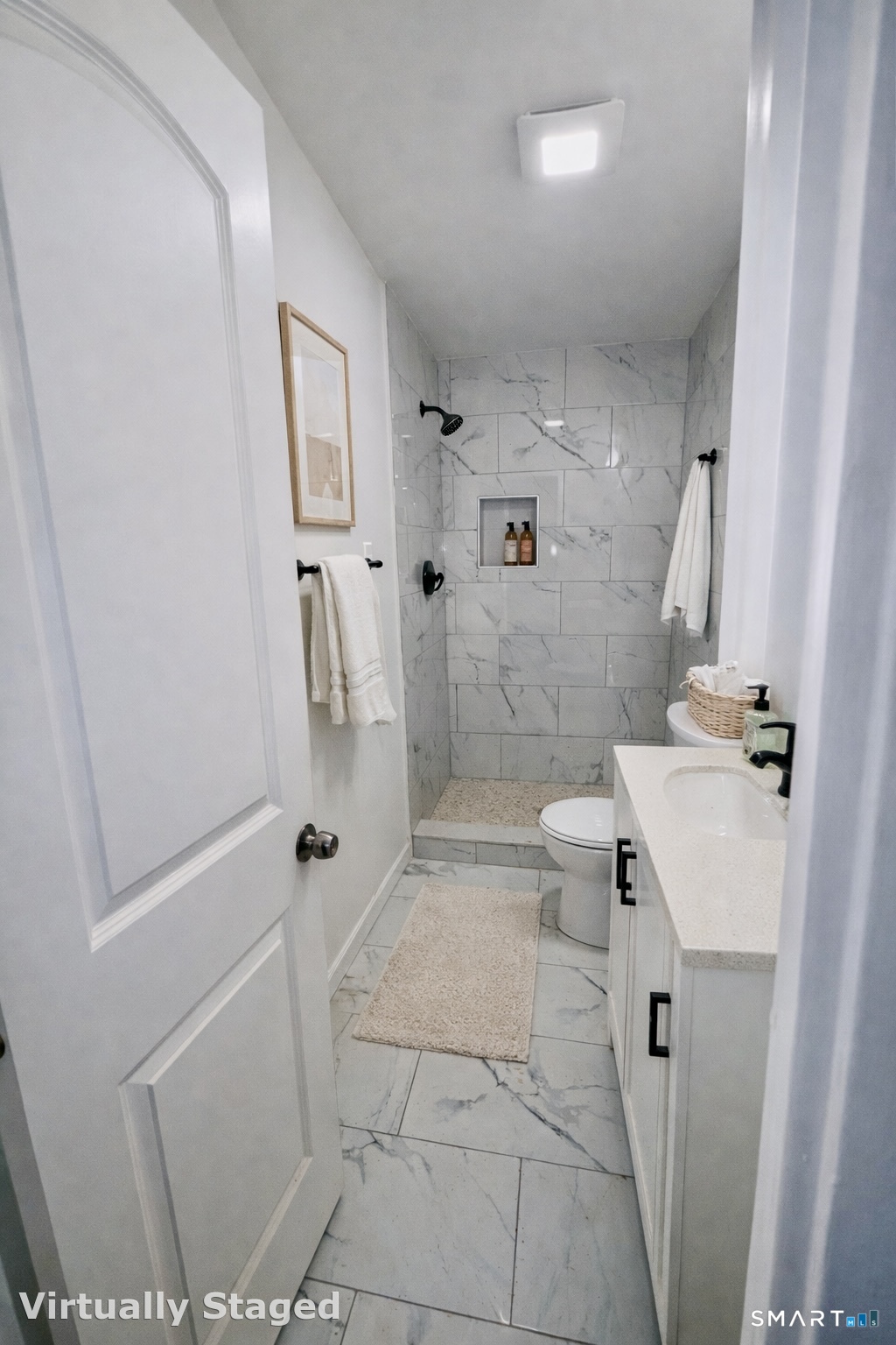 1415 Stratford Avenue Bridgeport, CT 06607 - Photo 6 of 14 a bathroom with a sink a toilet and shower