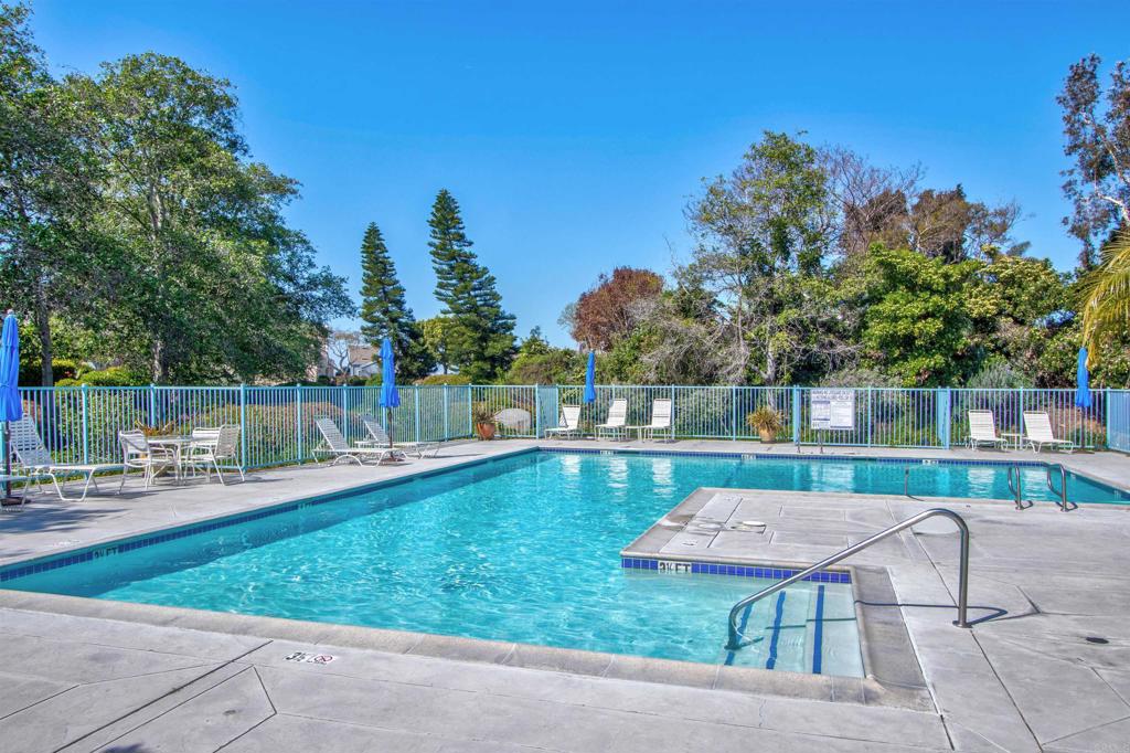 855 Lavender Way Carlsbad, CA 92011 - Photo 13 of 23 a backyard of a house with table and chairs