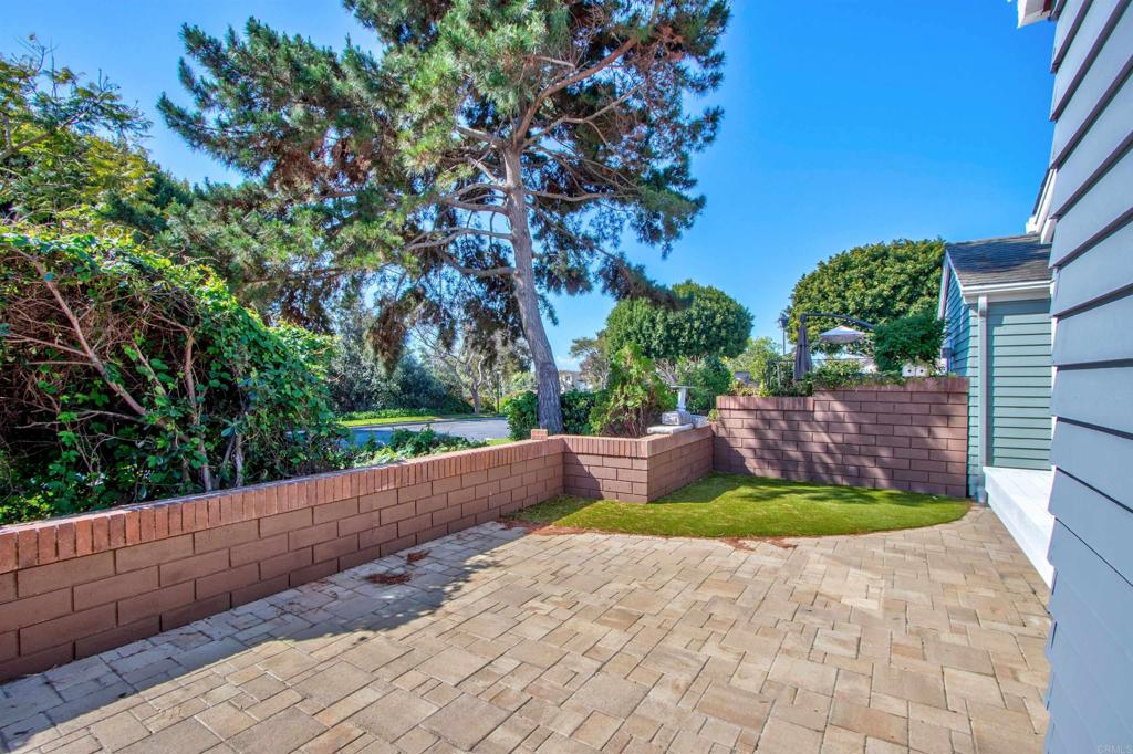 855 Lavender Way Carlsbad, CA 92011 - Photo 17 of 23 a view of a back yard with flower plants
