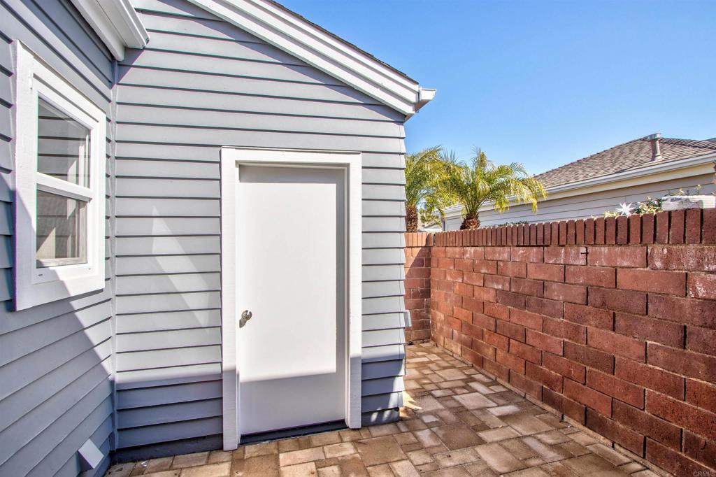 855 Lavender Way Carlsbad, CA 92011 - Photo 21 of 23 a view of wooden door and brick wall