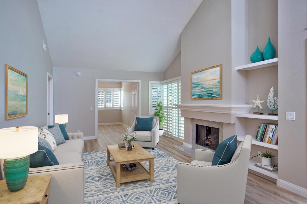 855 Lavender Way Carlsbad, CA 92011 - Photo 3 of 23 a living room with furniture and a fireplace