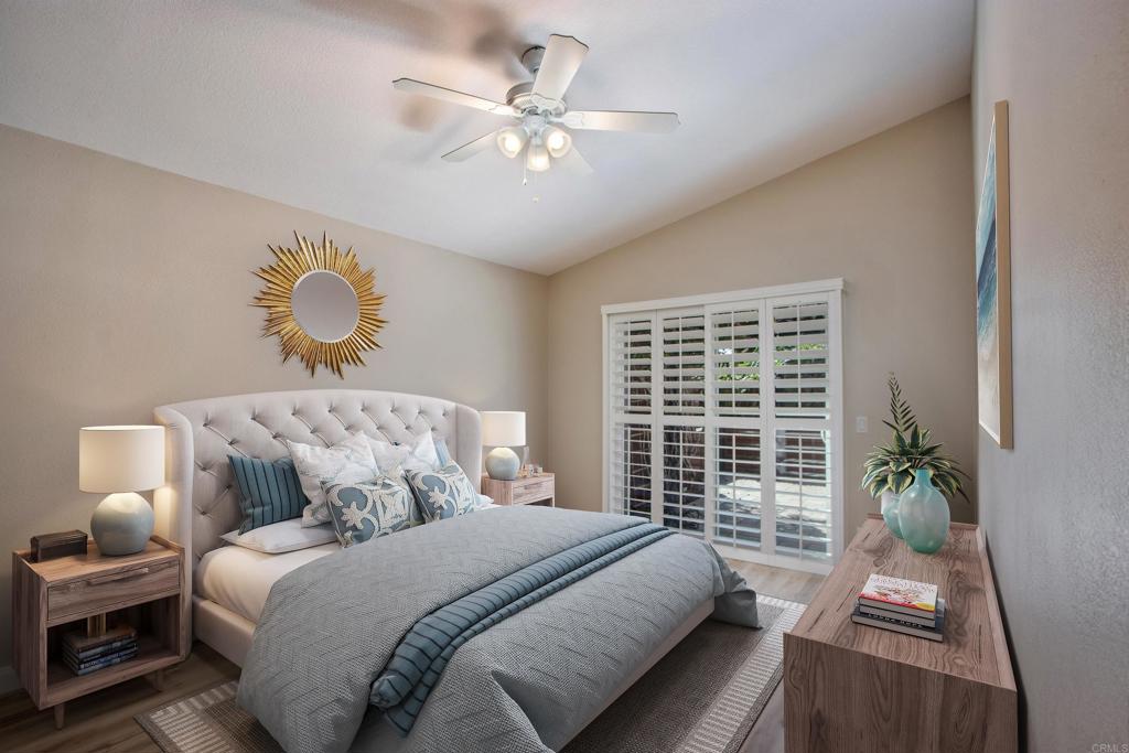 855 Lavender Way Carlsbad, CA 92011 - Photo 5 of 23 a bedroom with a large bed and a window