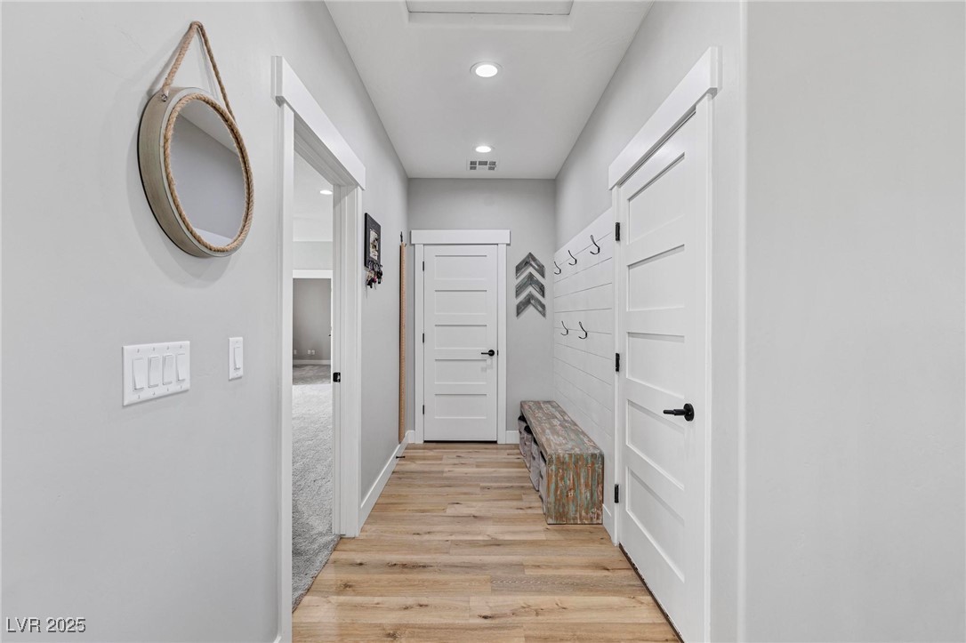 1395 Logandale Drive Logandale, NV 89021 - Photo 21 of 52 Hall leading to garage and bonus room
