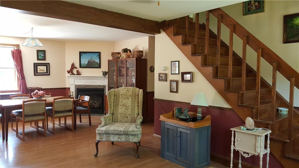 17 Sunnyside Road Bristol, ME 04539 - Photo 15 of 31 Living room with front stairway to...
