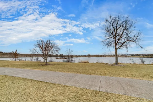 a view of a lake with a big yard