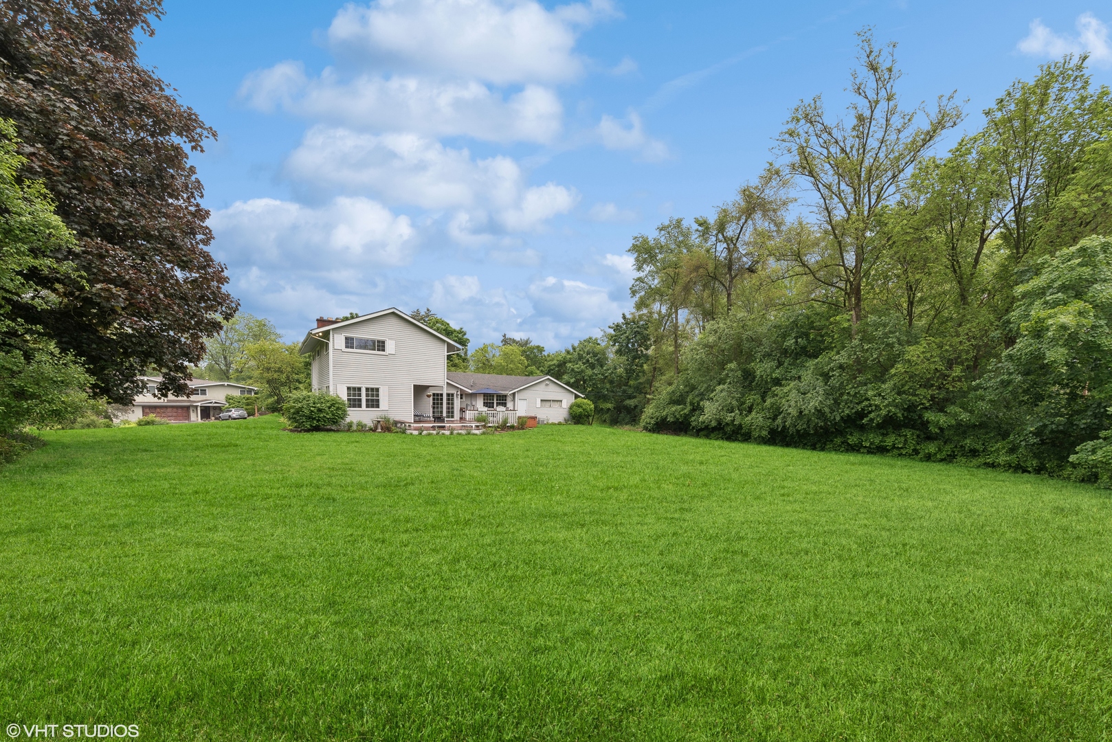 224 Orchard Road North Barrington, IL 60010 - Photo 30 of 34 a view of a house with a big yard and large trees